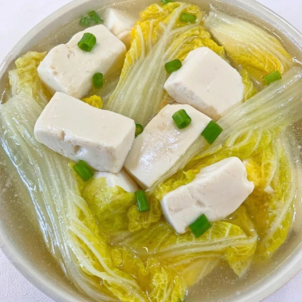 Napa cabbage and tofu soup garnished with green onions at Liu Roast Fish, an Chinese Restaurant in City of Industry
